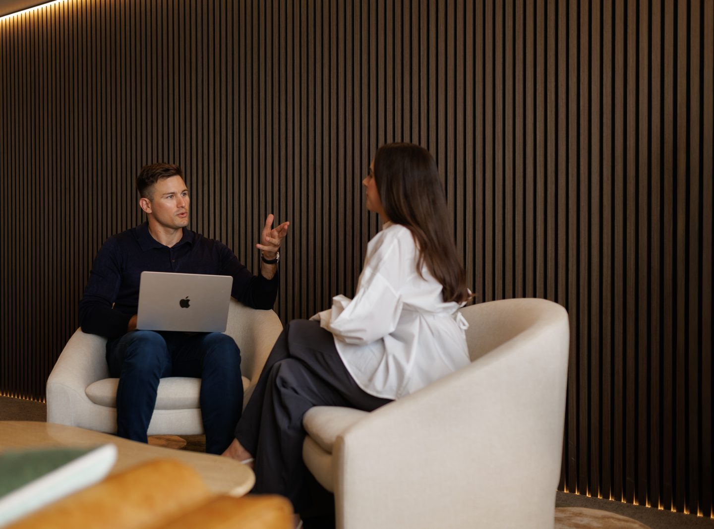Josh Birch talking strategy with a client